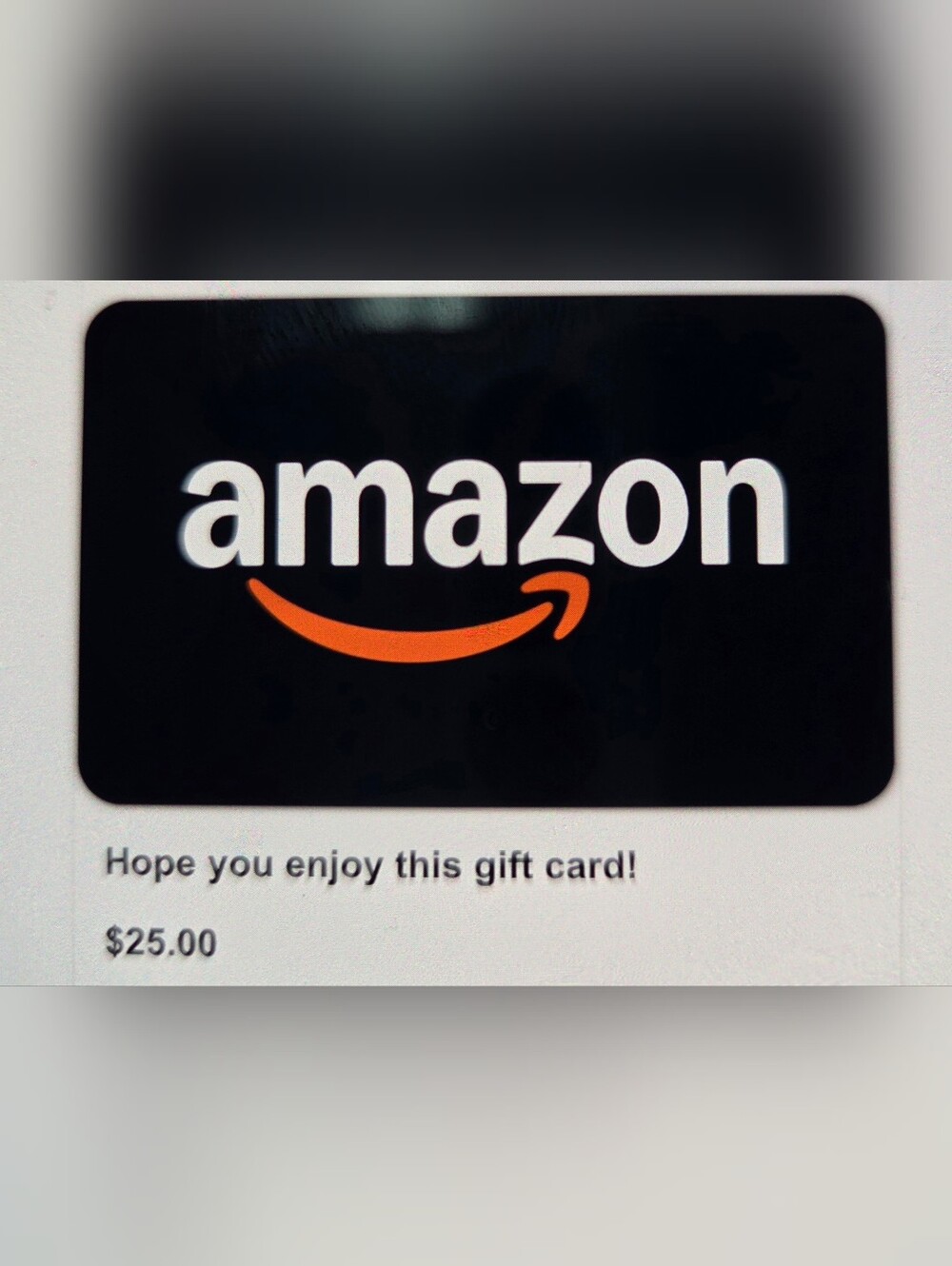 GIVEAWAY Amazon Black Card with Orange Smile Logo